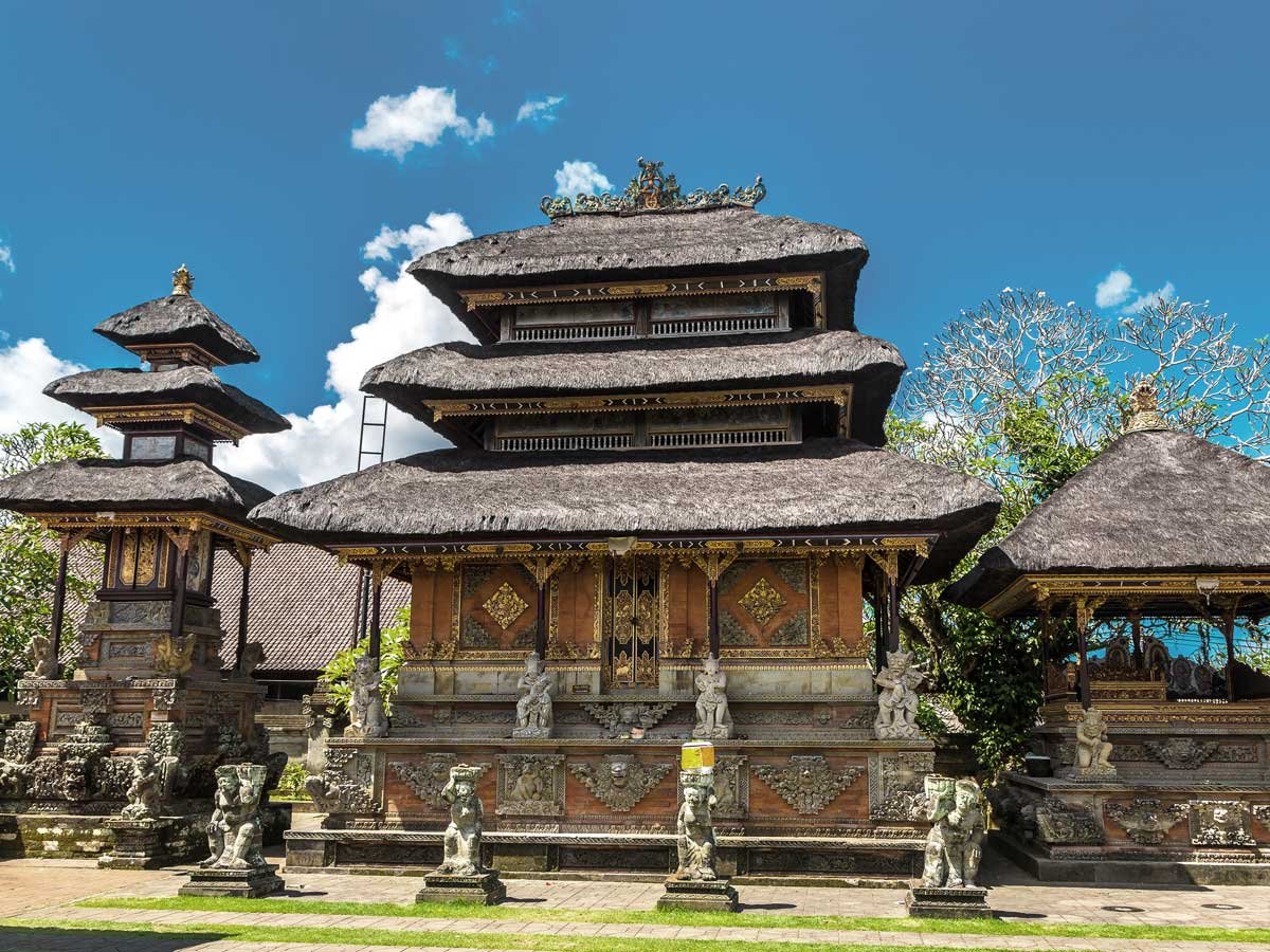 Quiet shaded courtyard of Pura Batuan temple