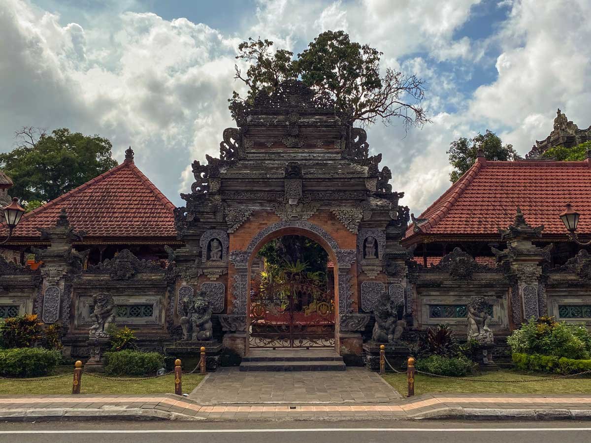 Carved stone gates and courtyard of Ubud Palace